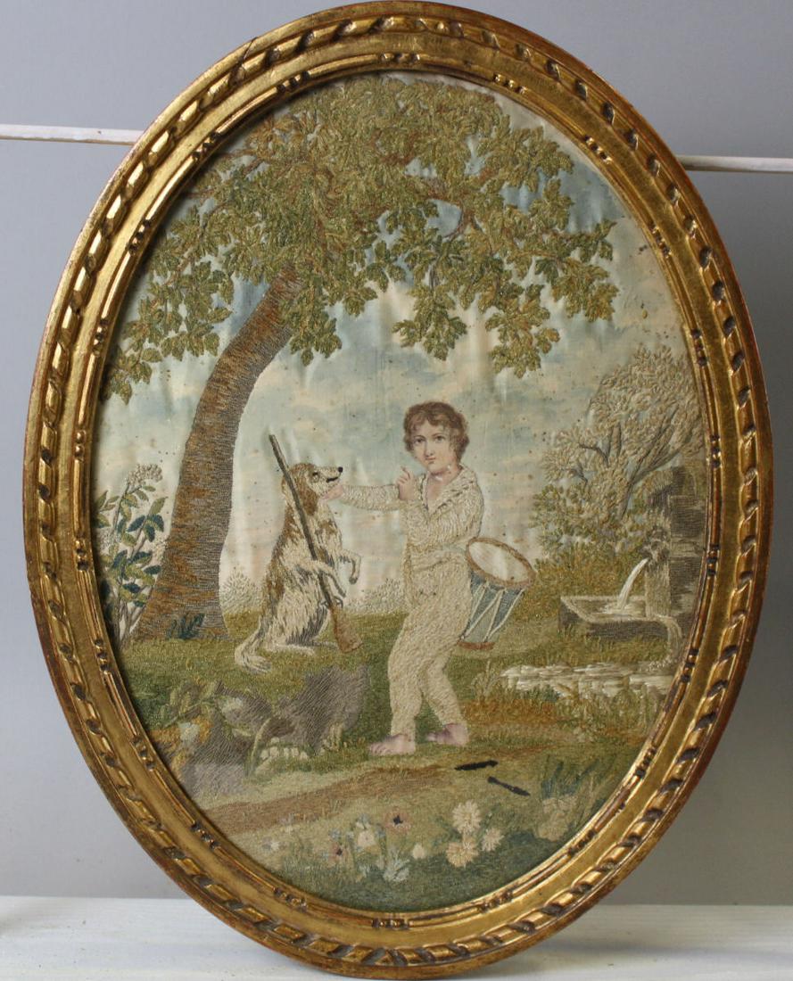 19th C Boy w/ Drum & Dog Embroidered Picture: 19th C Boy w/ Drum, Dog with Long Gun Silk Embroidered Picture - pump spewing water, flowers, all under large tree, 16 3/4" H x 13" W giltwood oval frame, several style stitches, very good condition.