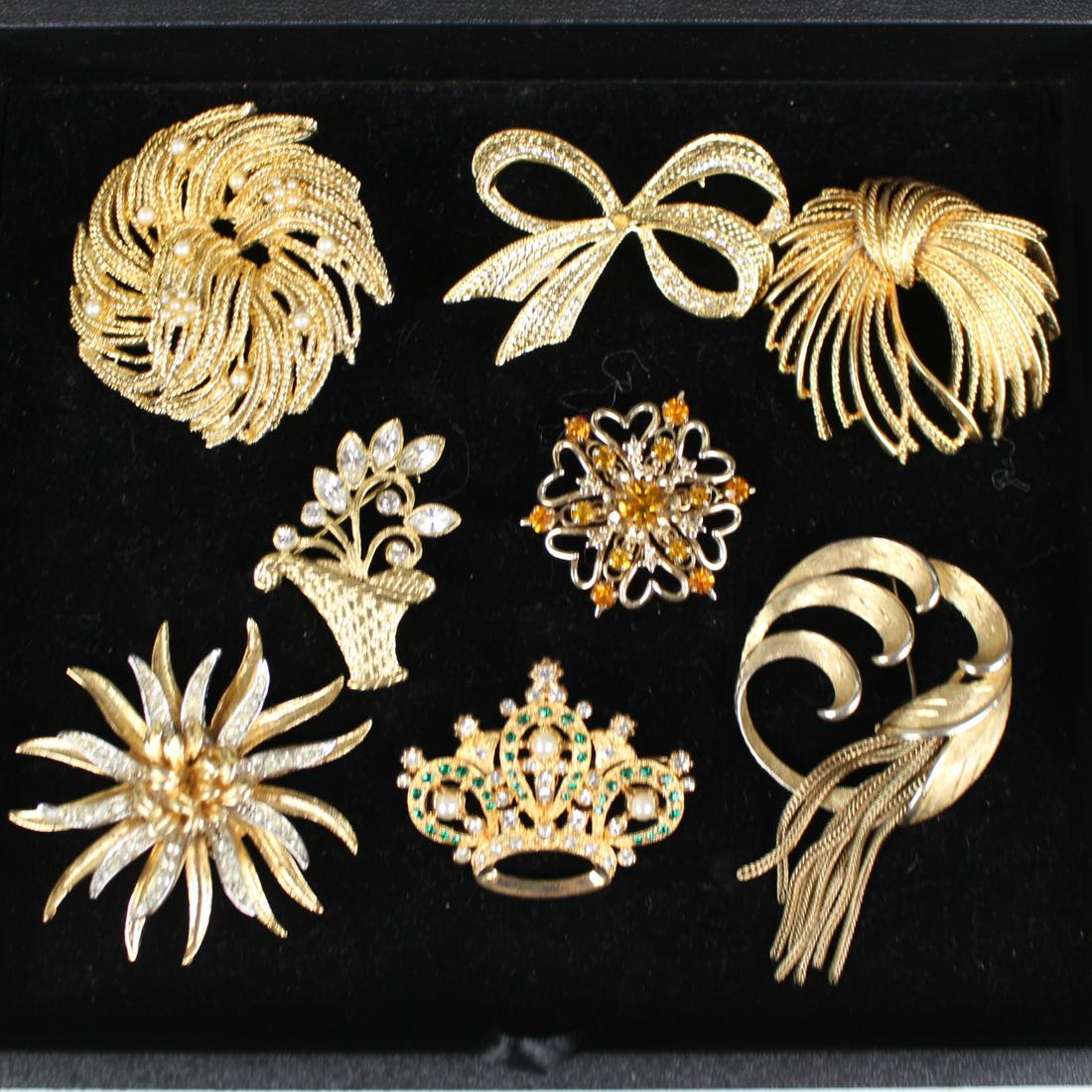 Group of Vintage Costume Jewelry: Group of Vintage Costume Brooch Jewelry - pearls and rhinestones, Esienberg Ice, Monet, Coro, largest piece measures 2 1/2" W. Many more lots of vintage jewelry mixed throughout this auction. Note: Vi