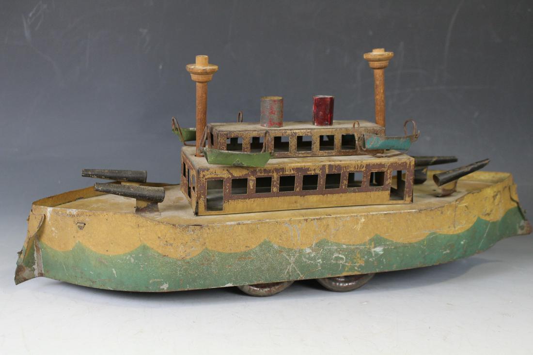 C1915 Dayton Hillclimber Gun Boat Toy: C1915 Schieble Dayton, OH Pressed Steel Hillclimber / Hill Climber Gun Boat Toy - painted sheet metal and wood, 19" L, lacking 2 single wheels, replaced / altered masts.