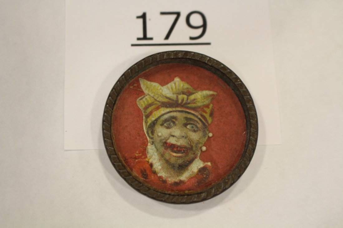 Black Americana Woman Dexterity Game: Dexterity game / handheld puzzle game with image of a black woman, all metal, 1 3/4" W. Good.