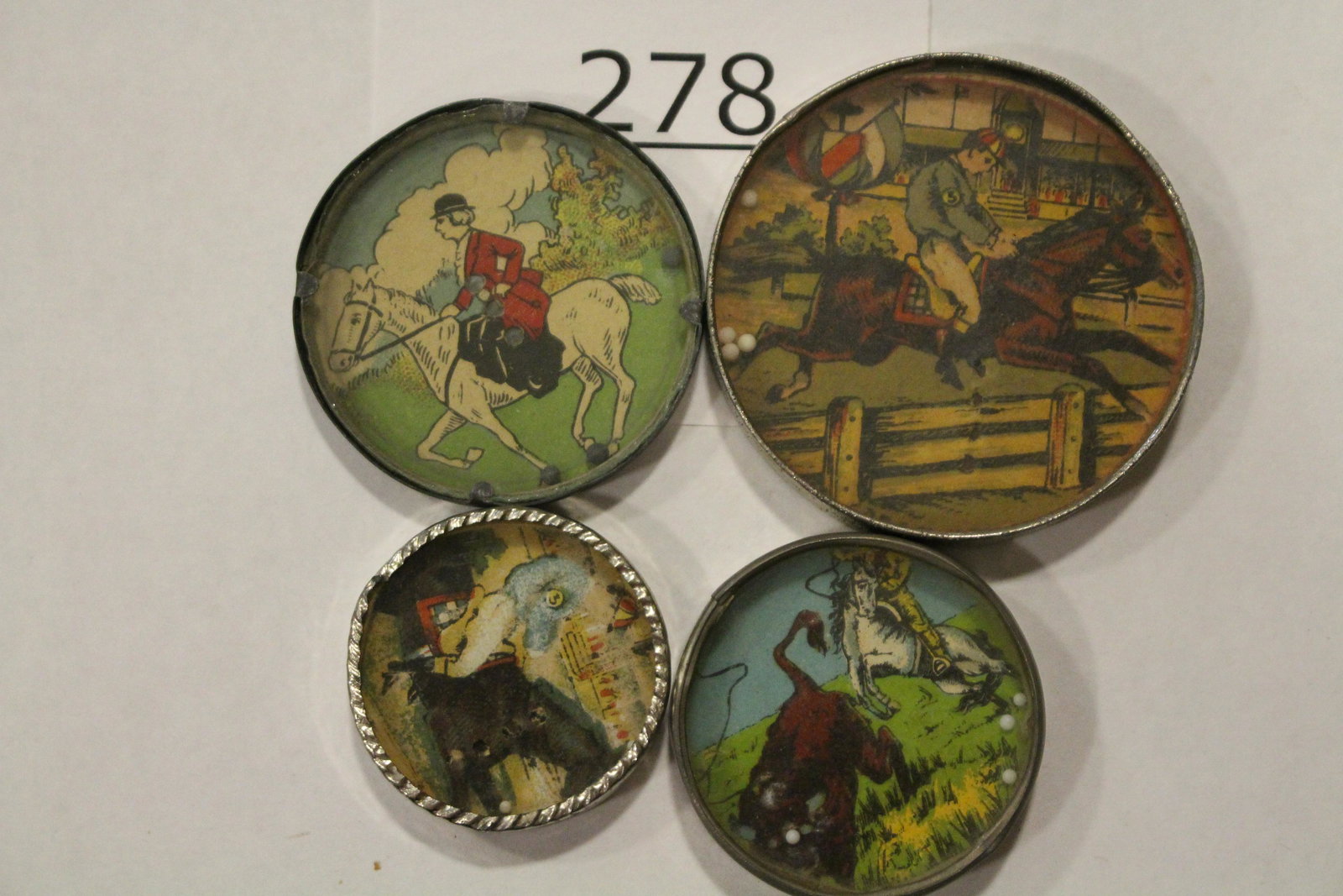 4 Sports-Themed Horse Dexterity Games: Dexterity games / handheld puzzle games with images of horses and riders, largest 2 1/4" H. Good.