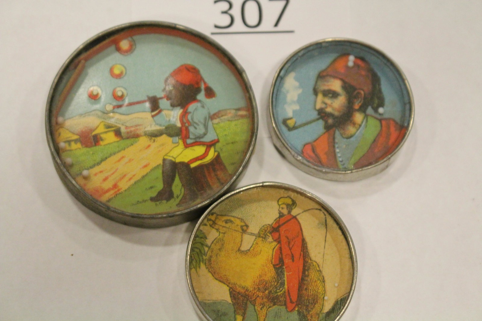 Lot of 3 Arabian-Themed Dexterity Games: Lot of 3 Arabian-themed dexterity games / handheld puzzle games, largest 2 1/2" W. Good.