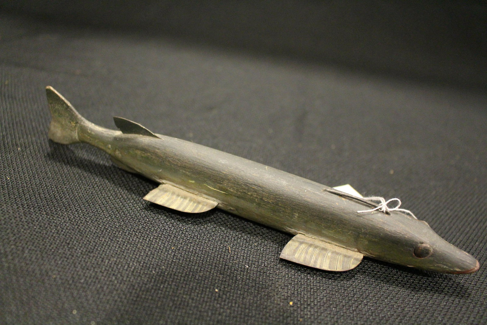 Antique Carved & Painted Ice Fishing Decoy: Antique Carved & Painted Ice Fishing Folk Art - pike?, long dark to lighter green wooden body, glass eyes, tin fins painted and with crimped edges, textured and attached tin tail, line attachment is l