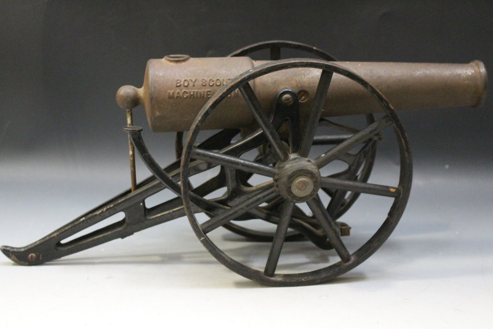 Large Size Kilgore Boy Scout Machine Gun: Large Size Kilgore Boy Scout Toy Machine Gun / Cannon - cast iron gun, wooden wheels, 8'' H.
