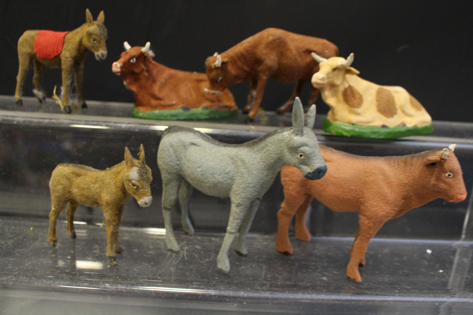 Christmas Putz Stick Leg Animals: Christmas Paper / Papier Mache Putz Stick Leg Animals - cows 2 marked made in Germany, 3 donkeys, 2 with partial made in Germany labels.