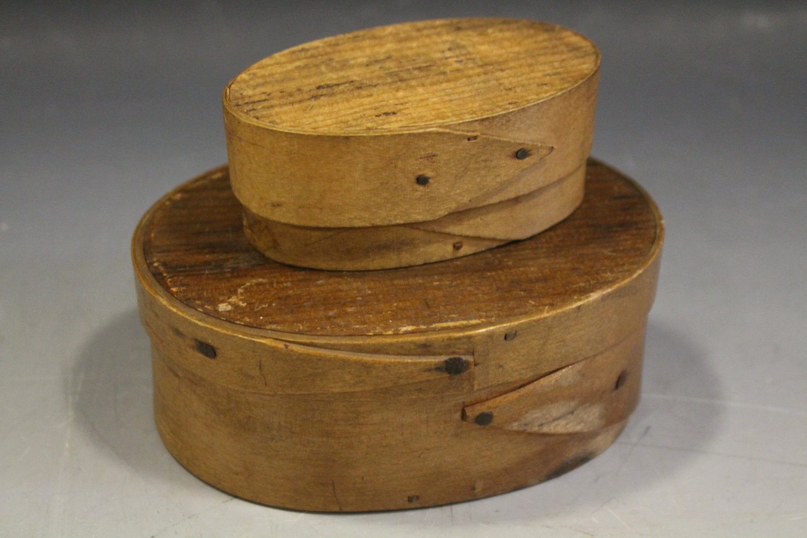 19th C Signed Shaker Oval Pantry Box: 19th C Signed Shaker Oval Pantry Box & Unsigned Small Oval Pantry Box - 1) incised / signed I Whiton on lid, 5 1/2'' W x 2'' H; 2) smallest unsigned, but has illegible writing on underside of box, 4''
