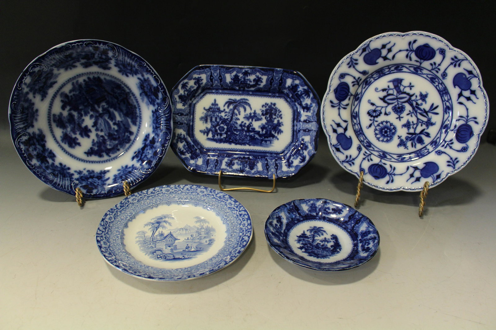 Flow Blue Tray, Saucer, Veg Bowl & Dinner Plate: Flow Blue Tray, Saucer, Veg Bowl & Dinner Plate - 1) Kyber saucer; 2) Kyber oblong tray, 7 1/2'' x 10''; 3) vegetable bowl, 10'', illegible; 4) Johnson Bros Holland plate, 10''; 5) Festoon Wedgwood pl