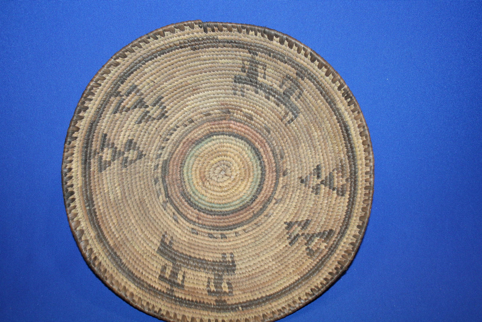 Coiled American Indian Basket w/ Figures & Geometric: Coiled American Indian Basket with Figures and Geometric Design - 12" W x 2 1/2" H. No issues.