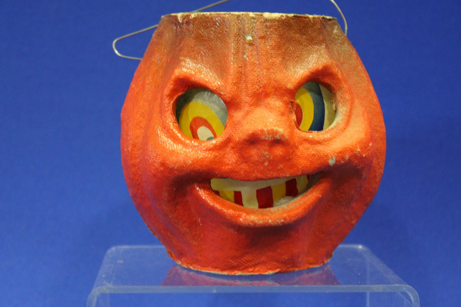 Halloween Pulp Jack-o-Lantern, 4 1/2" H: Halloween Pulp Jack-o-Lantern, 4 1/2" H - evil face with interior insert, painted finish, original printed paper insert, wire handle.