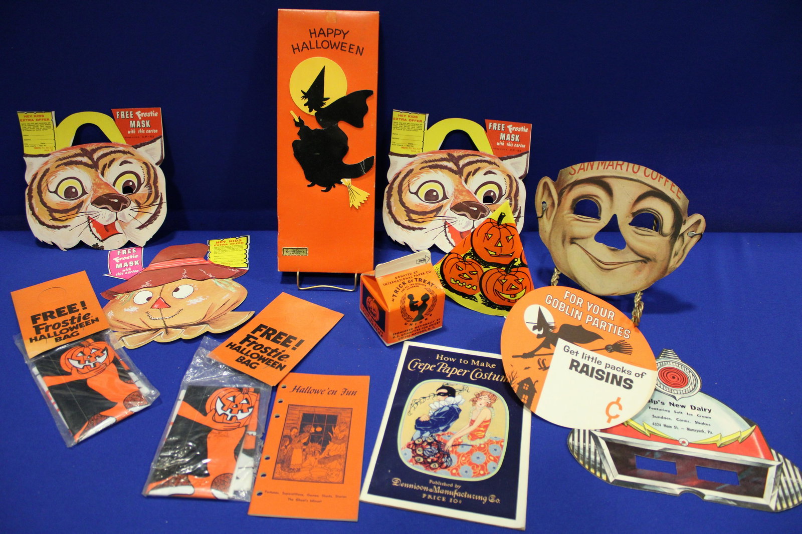 Halloween Advertising Premiums / Coupons Ephemera: Large Group Halloween Advertising / Premiums Ephemera - 1) Group of 3 1953 coupons / premiums for Frostie cardboard masks 9" H; 2) 1950s spacceman advertising cardboard mask for Sip's Dairy Ice Cream,