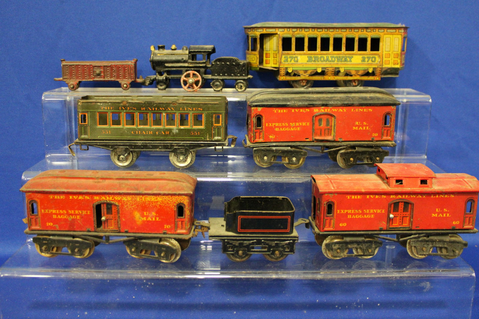 Ives Misc Tin Litho Train Cars: Ives Misc Tin Litho Train Cars - chair car lacking roof, also includes misc non-Ives 8" L trolley car and miniature cast iron5 1/2" L train engine and boxcar.