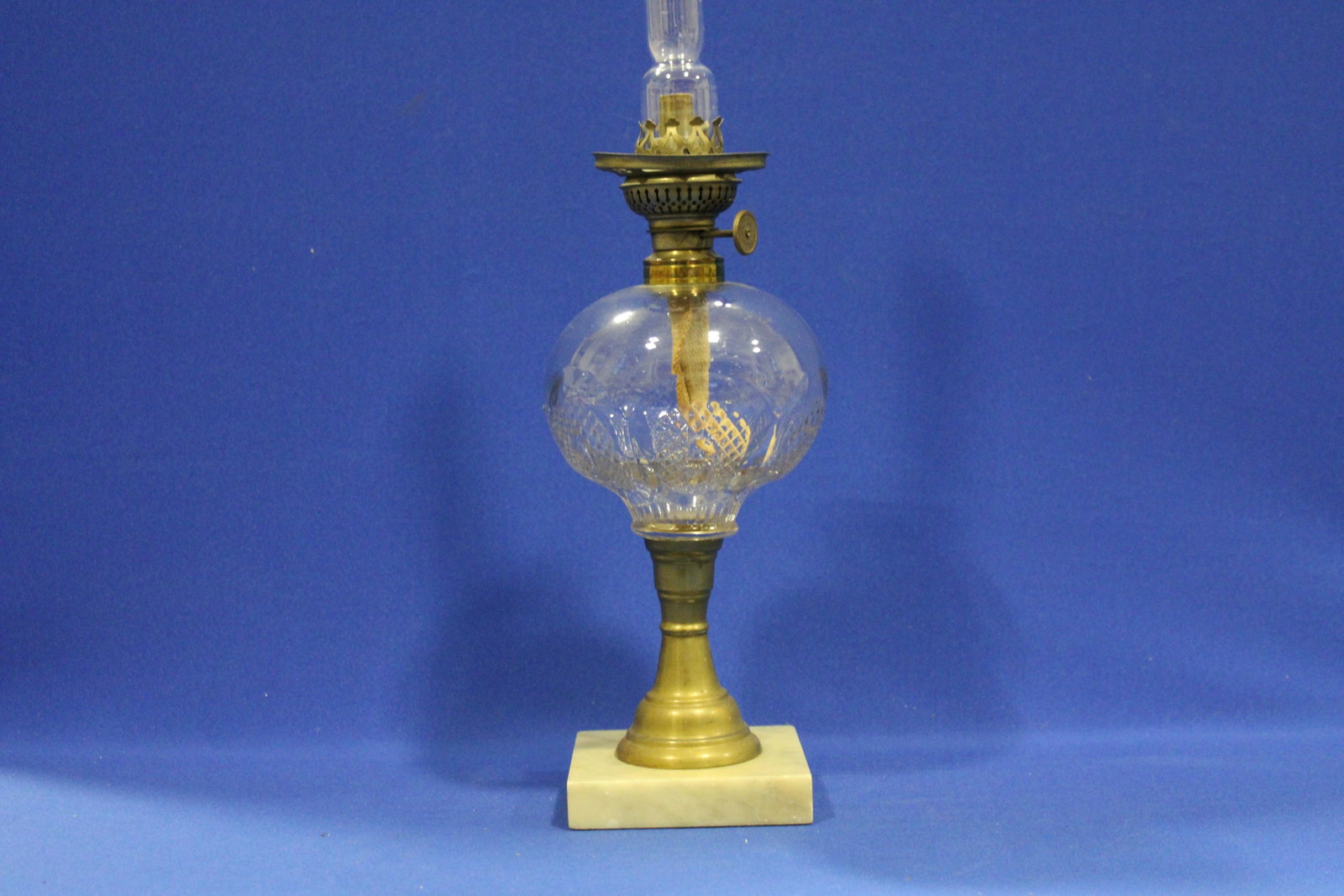 E.M. & Co. Whale Oil Fluid Stand Lamp, The Boudoir: 19th C E. M. & Co. Early Fluid / Whale Oil Stand Lamp, Titled The Boudoir - molded font, maker's mark on wick thumb knob, mounted on marble base, 9 3/4" H to top of collar.