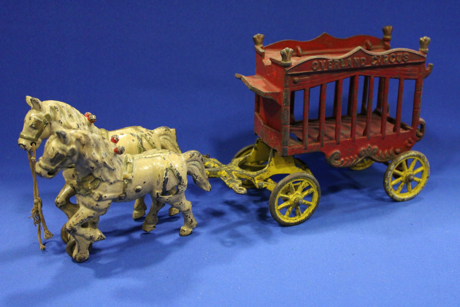 Cast Iron Overland Circus Wagon & Horses: Cast Iron Overland Circus Wagon & Horses - lacking driver and animal. 14" L.