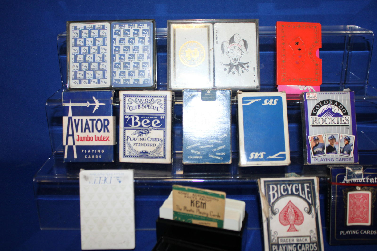 Lot of Playing Cards - Advertising, Bakelite & More: Lot of Playing Cards - Notre Dame double deck; LOF double deck; 1940 Kem in Bakelite case with original pamphlet; SAS; Delta; Kent III; 1993 Colorado Rockies Baseball team.