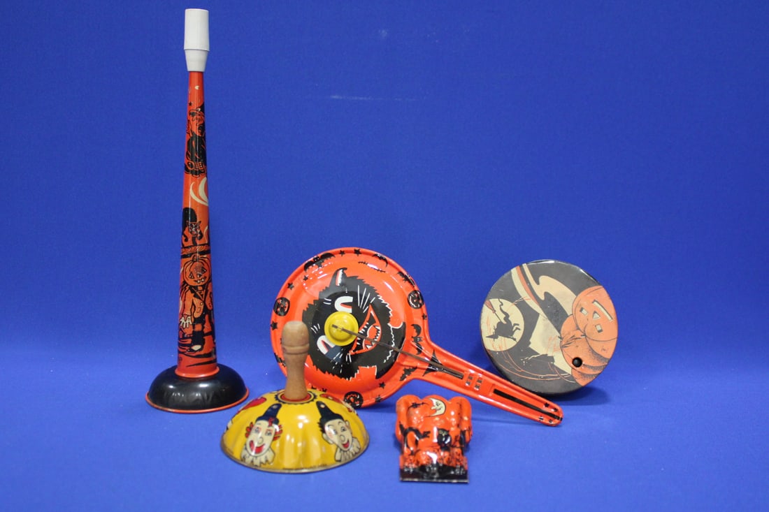 Group of Vintage Halloween Noise Makers: Group of Vintage Halloween Noise Makers - 1) horn, marked US Metal Toy Co, 10 3/4" H; 2) single side cat clapper; 3) witch and pumpkin turner noise maker, 4" H; 4) Life of the Party Products bell ring