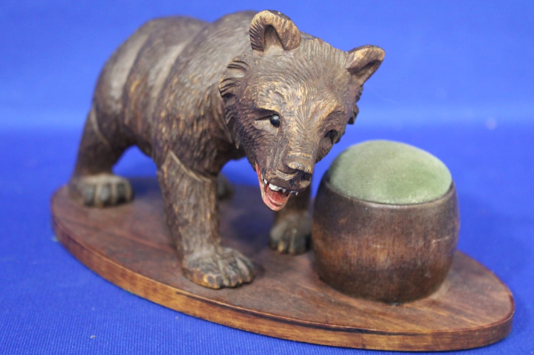 Black Forest Carved Bear Sewing Pincushion: Black Forest Carved Bear Sewing Pincushion - bear with glass eyes and tiny sharp teeth, honey pot pincushion, well-carved, 4 1/2 X 8 1/2". Other black forest selling in this sale.