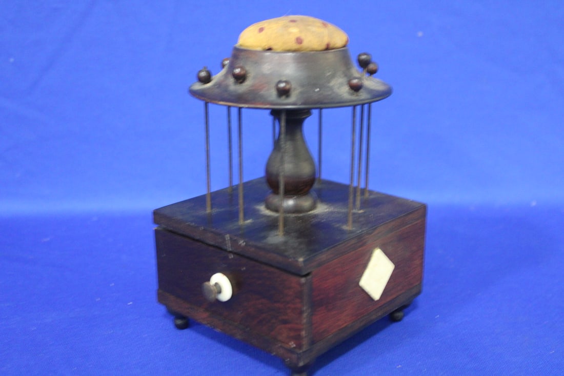 Sailor Art Sewing Pincushion Thread Holder: Sailor Art Sewing Pincushion Thread Holder w/ Drawer - bone inlays and back with fancy carved floral MOP inlay, 7 1/2" H, chip to back, see photo.