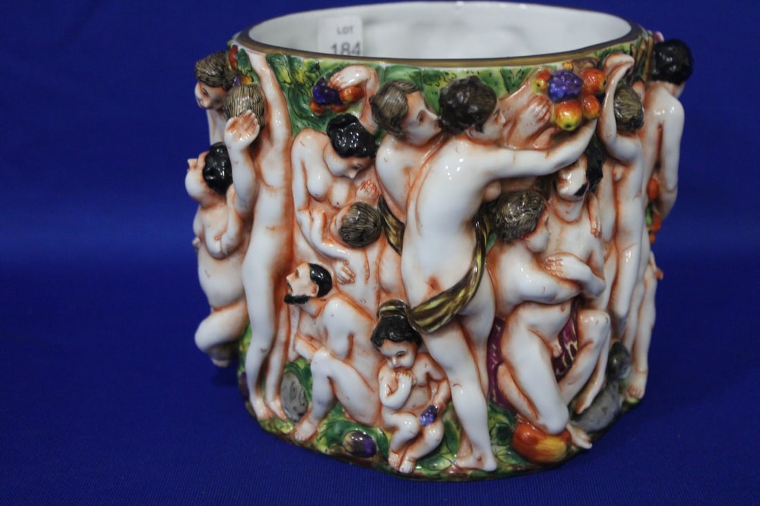 High Relief Nude Capodimonte Oval Jardiniere: High Relief Nude Capodimonte Oval Jardiniere - Neoclassical / Mythological / Biblical scenes, hand painted, lid with cherubs surrounding a cart of flowers, nude men, women, children and animals, jardi