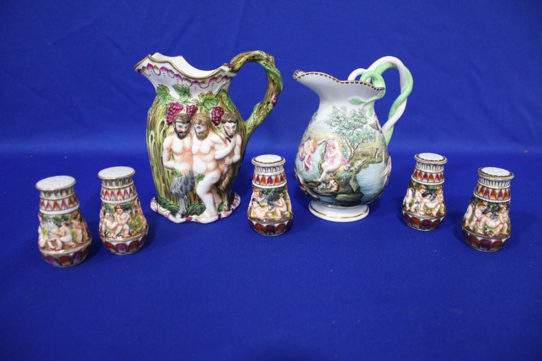 Capodimonte Jugs w/ Twisted Handles & Shakers: Capodimonte Jugs w/ Twisted Handles & Shakers - Neoclassical / Mythological / Biblical scenes, hand painted, lid with cherubs surrounding a cart of flowers, 1) high relief decorated with faun men/half