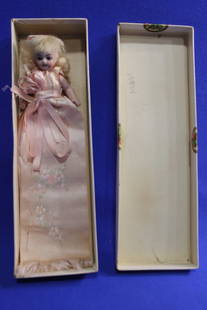 Bisque Sewing Doll w/ Pins on Fine Ribbon: Tiny Bisque Sewing Doll w/ Pins on Fine Silk Ribbon - in original fitted Christmas gift box, all original doll with blond wig, glass fixed eyes, painted lips and brows, fine ribbon belt and
