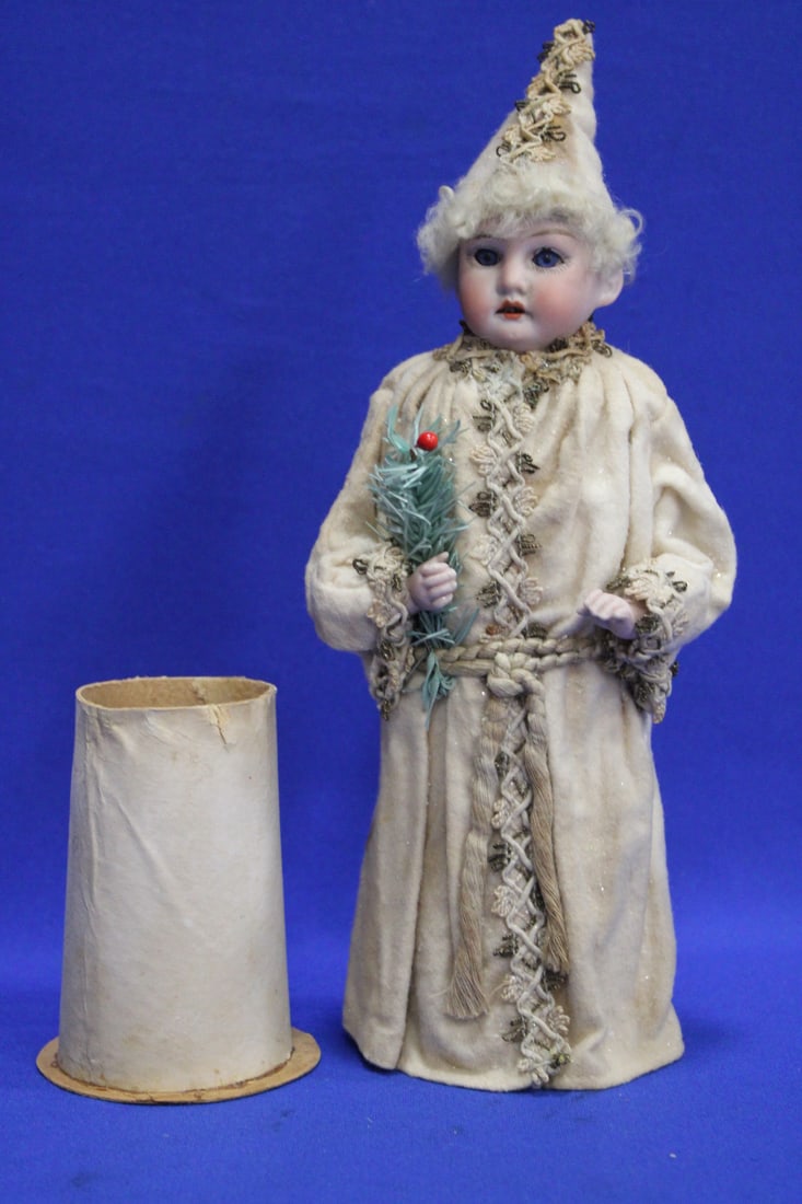 Early 1900 Bisque Doll Candy Container, Germany: Early 1900 Tall Bisque Shoulder Head Doll Candy Container - glass eyes, open mouth w/ teeth, painted on lashes, brows, lips and blushed cheeks, dimpled chin, holding sprig of Christmas feather branch