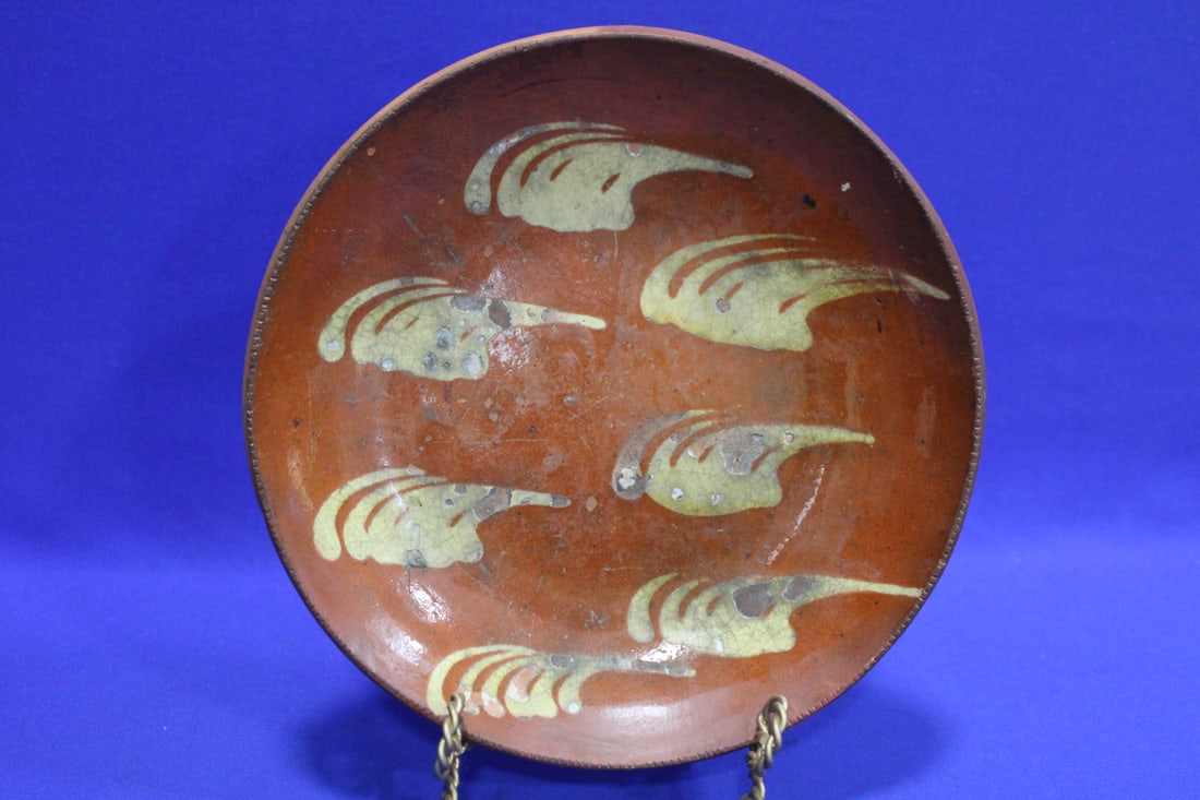 19th C Pennsylvania Slip Decorated Redware Plate: 19th C Pennsylvania Slip Decorated Redware Plate - unusual pattern, 10 1/2" W x 1 3/4" H.