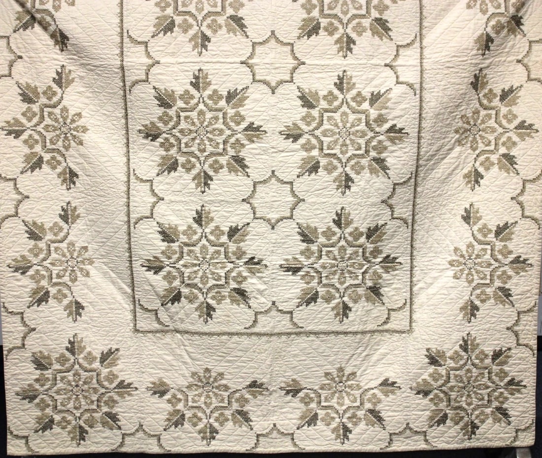 Cross-Stitched Quilt with Gold Threads (1 of 3)