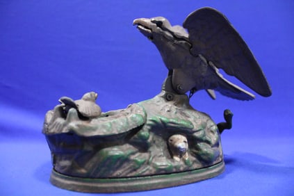 1883 Eagle & Eaglets Mechanical Cast Iron Bank