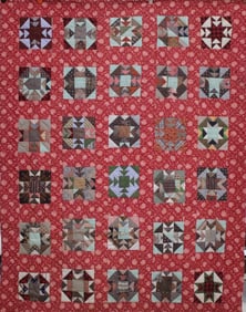 Red Fabric w/ Goose Tracks Squares Quilt