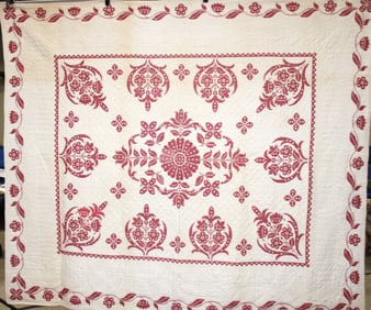 Red Cross-stitch Quilt with Floral Center