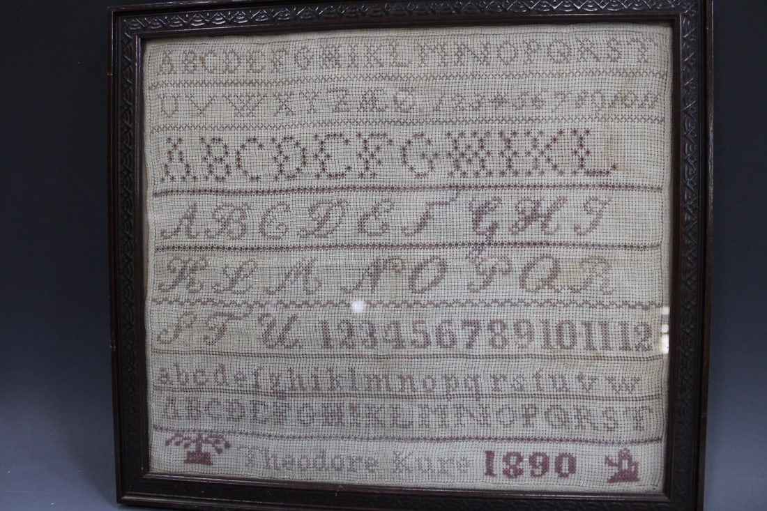 1890 ABC Sampler w/ Male Name: 1890 ABC Sampler w/ Male Name - several styles and size of letters and numbers, small tree bottom left, last line "Theodore Kure 1890", 14 1/2" W x 13" H. One of over 30 early samplers in this sale.