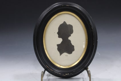 Oval Frame Silhouette of Lady Sitter