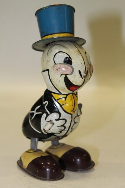 Linemar Jiminy Cricket Tin Wind-Up - Japan: Copyright Walt Disney Productions, lithographed tin, dressed in full tux and top hat, clockwork mechanism, 7"H
