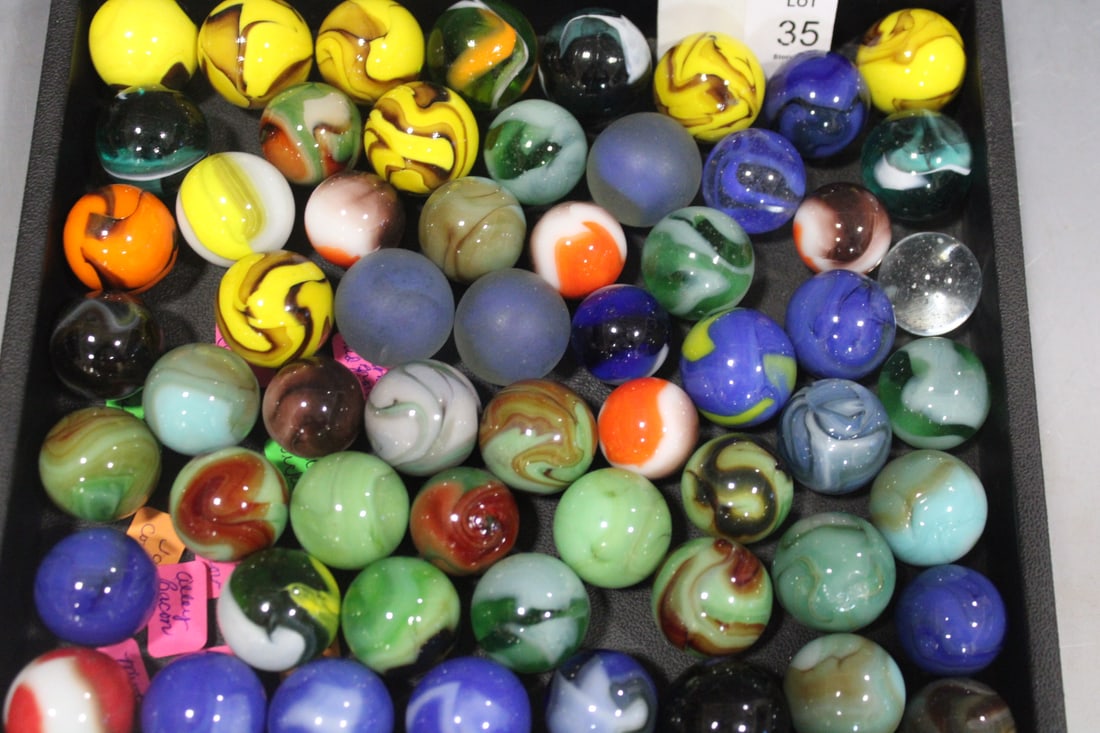 Large Group of Collectible Marble Shooters: Tentatively identified as per labels attached to the bags - each approximately 1", Yellow Jacket; Swirl; Red Coral; Wizard; Vintage Vitro Rainbow