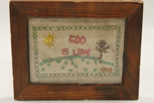 1890 Miniature Framed Sampler "God is Love": Miniature framed sampler "God is Love 1890" in original pine frame.