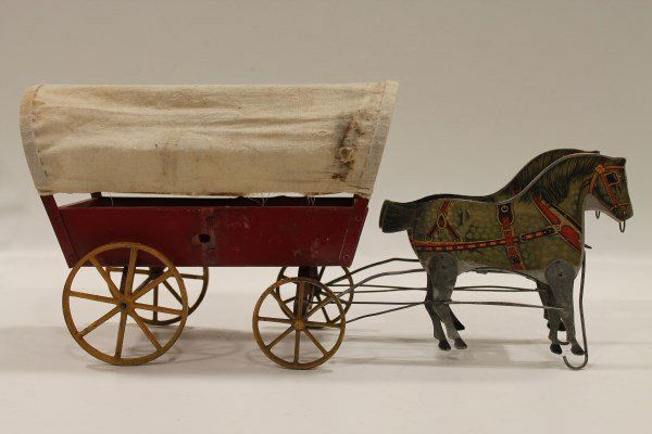 Gibbs Mfg. 1910 Covered Wagon with Mechanical Horses: 1910 Gibbs Mfg. Co, Canton, Ohio, covered wagon pulled by mechanical lithographed paper over wood horse team with metal legs - horses "walk" when pulled, wood and metal wagon, cast spoke wheels, 19" L