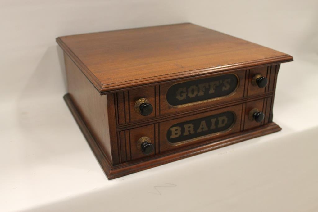 Goff's Braid 2-Drawer Merchant's Cabinet: Goff's Braid Embroidery Thread walnut merchant's display cabinet, 2-drawers, original painted lettering on wood drawer fronts, "Goff's Braid Best Made" on back customer's side, 17 1/2 x 7 1/2 x 18.