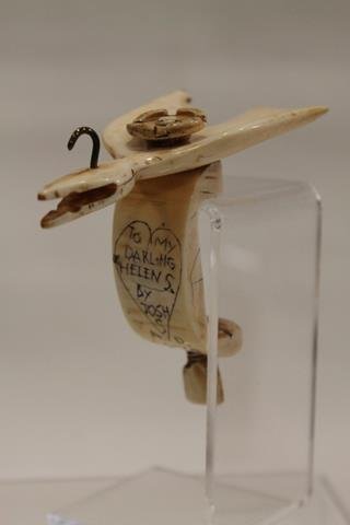 1872 Ivory Bird Sewing Clamp: Victorian ivory sewing clamp in the form of a bird, scrimshawed inside a heart, "To My Darling Helen S. By Josh, 1872 A.D." Note: This lot is part of a large 35 lot Victorian sewing collection selling