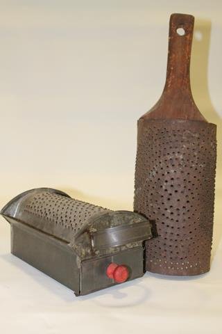 19th Century Tin Kitchen Graters: Pair 19th century wooden and tin graters - tin with drawer 9 3/4" H; tin with wooden back, 15 1/4" H.