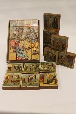 2 Sets Paper on Wood Children's Blocks: ABC blocks with Baseball player, black hunters, man coonskin cap with long gun, American Indian, fireman, others; Victorian paper on wood puzzle blocks, missing lid of original container.