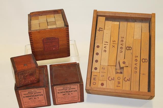 Milton Bradley's Occupational Blocks: The Milton Bradley Co. believed in F. Froebel's philosophy using these "gifts" which were objects to handle, such as geometric wooden blocks used in self-directed free play. He also used "occupations,