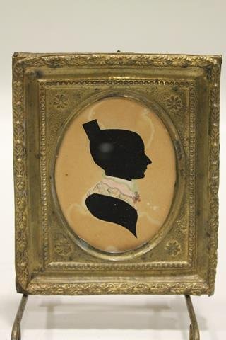 C. 1830 Hollow Cut & Watercolor Silhouette: New England, hollow cut fabric under paper, watercolored collar with brooch, embossed brass frame, 5" x 4 1/2"