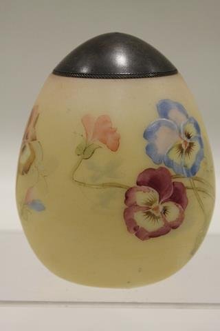 Mt. Washington Egg Sugar Shaker - Pansies: Hand-painted polychrome vividly colored pansies on pale yellow ground, satin finish, embossed "PAT'D" under base, original lid, Mt. Washington Glass Co., late 1800s, 4 1/4" H.