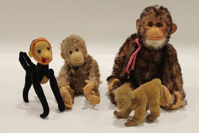 4 Mohair Jointed Monkeys - 1 Steiff: Jointed monkeys - two with long mohair, felt faces, one with Hermann tag; one velvet with shoe button eyes; smallest Steiff sheared mohair, felt feet, ears and face; largest 14".