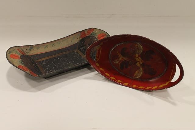 1800s Toleware Trays: Tole painted small apple tray in red paint, 11" L; bread tray in red and green paint, 14" L.