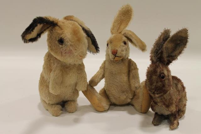 Steiff Mohair Rabbits: Two blond rabbits, one early brown Steiff, swivel heads, one all jointed, tallest 9" not including ears.