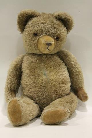 Large 26" Jointed Blond Mohair Teddy Bear: Long haired torso, arms, legs, head, shirred muzzle and pads, stitched toes, paws, nose and mouth, glass eyes, straw stuffed body, 26" H.