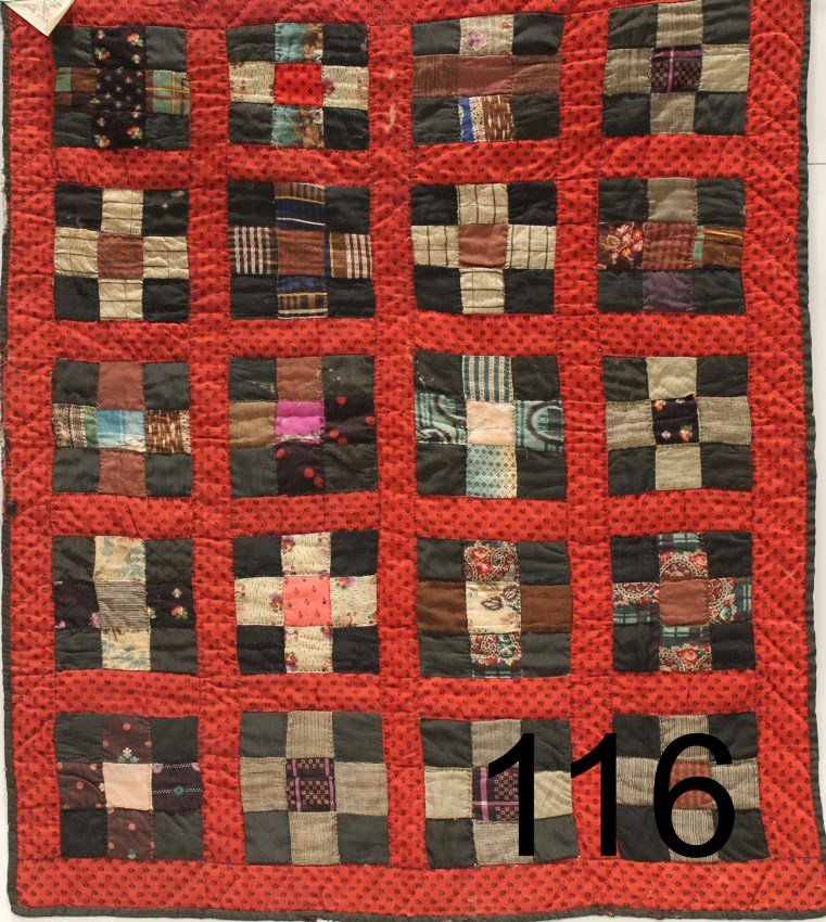 19th Century Pieced Crib Quilt - Pennsylvania: Mid-1800s - Red borders, patchwork in blacks, grays, white, red and green - some being printed fabric, has an old note attached and written with an ink pen "appx 150 yrs Mrs. Diebert", interesting pri