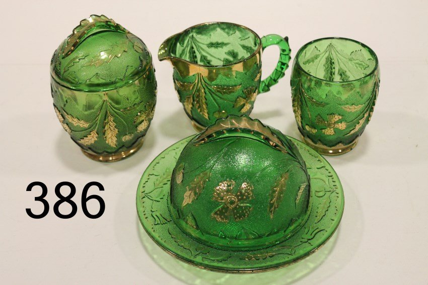 EAPG Delaware / 4 Petal Table Set - Green: EAPG, covered round butter, covered sugar, creamer, open sugar.