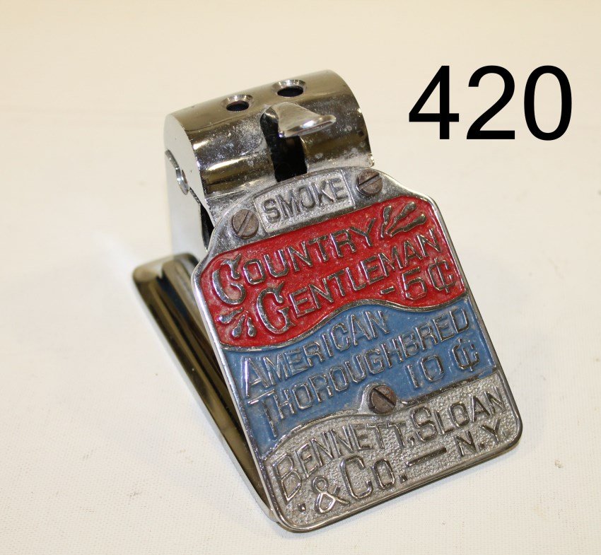 Bennett Sloan & Co. Country Gentleman Nickel-Plated: Nickel plated cigar cutter with match box holder and cigar rest, 4" H.